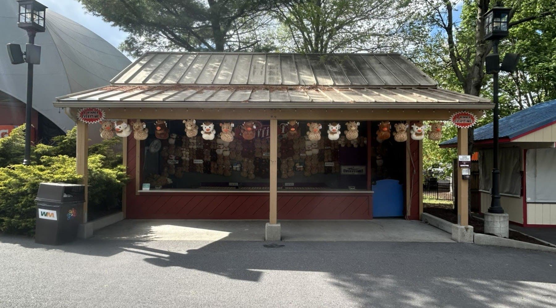 Try and land each ball on the red tins to win larger prizes