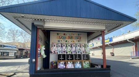 Knock all 4 blocks completely off the table with 1 throw