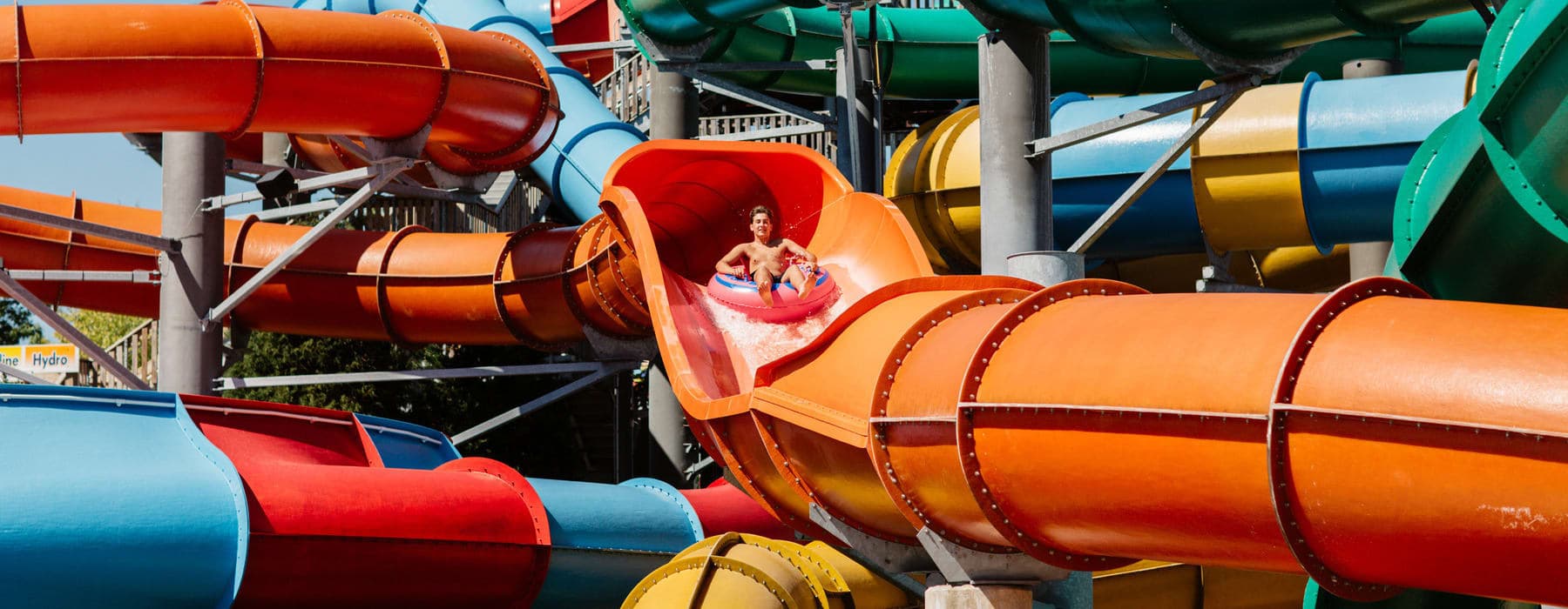 boy riding coastline plunge hydro water slide