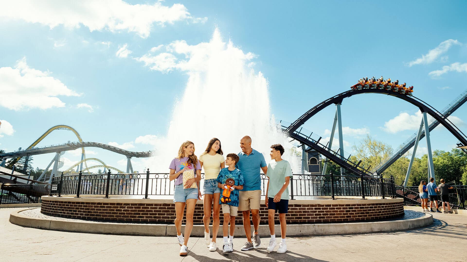 family-in-front-of-kissing-fountain-hersheypark.jpg
