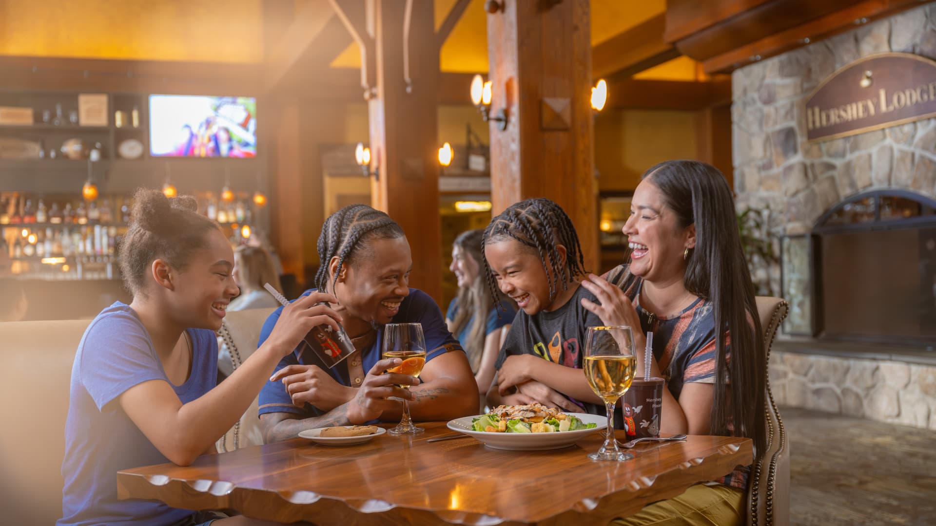 family-eating-and-drinking-in-the-lobby-of-the-hershey-lodge.jpg