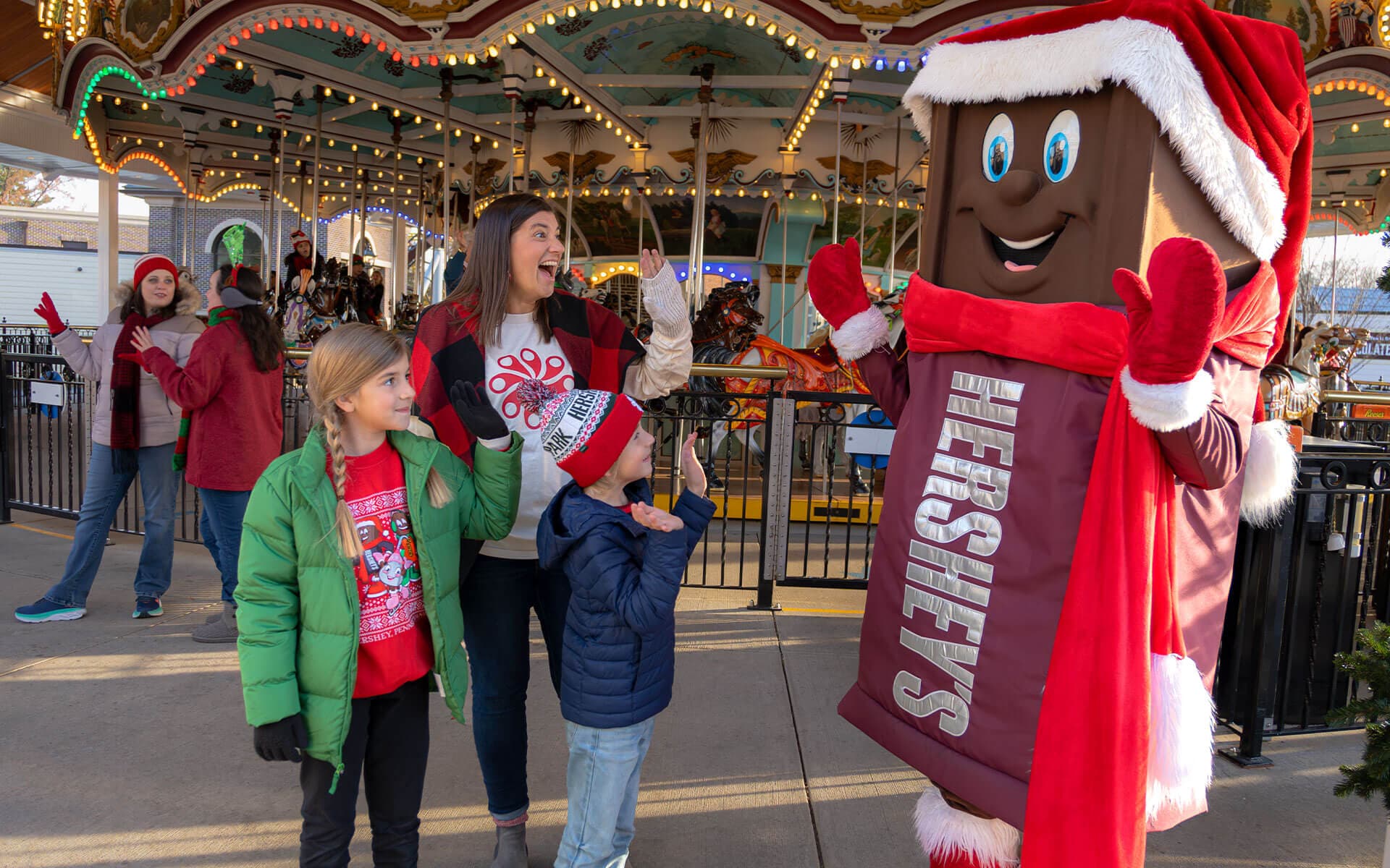 mom-and-kids-waving-carousel.jpg